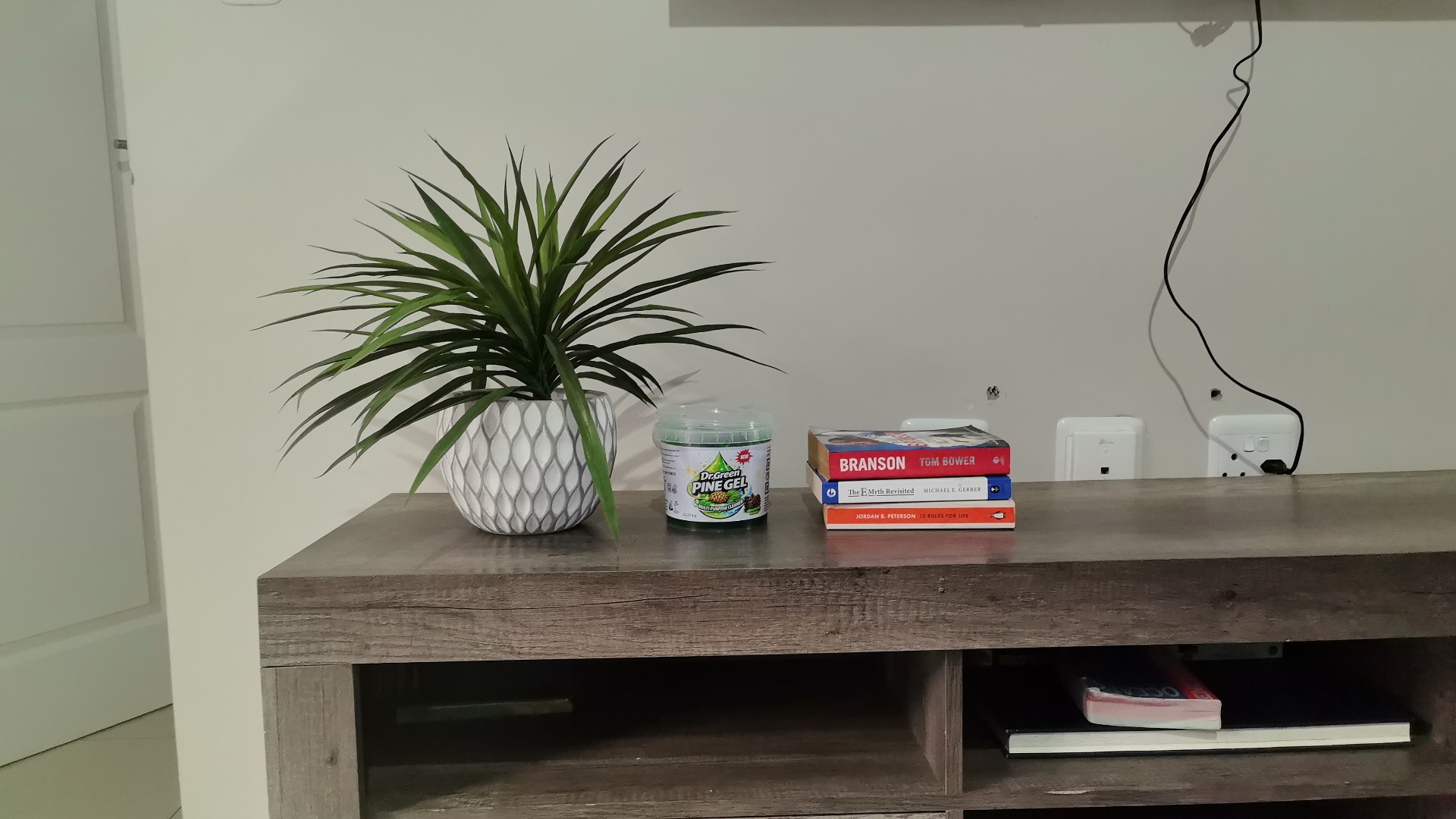 Dr Green Pine Gel at home on a TV unit